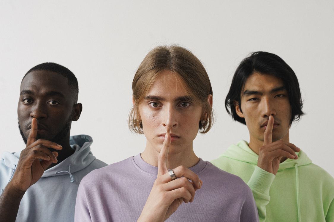 Men Doing a Shushing Hand Gesture · Free Stock Photo