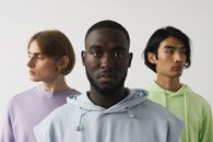 Man in White Polo Shirt Beside Man in Green Polo Shirt
