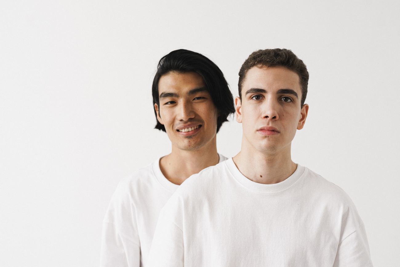 Two people in white shirts side by side — photo by SHVETS production on Pexels