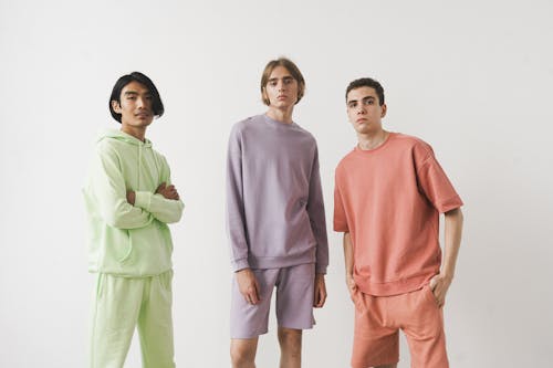 Free Group of Men Wearing Loungewear in Pastel Colors Stock Photo