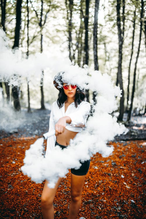 Free Woman Holding a Smoke Bomb Stock Photo