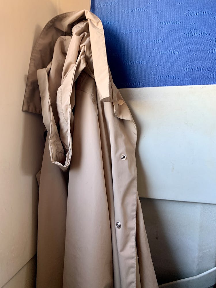 Coat Hanging On Wall