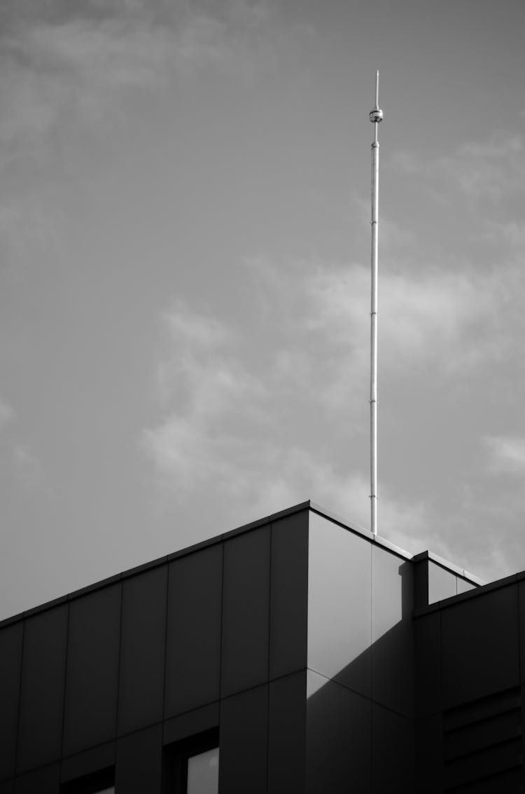 Antenna Mast On A Roof 