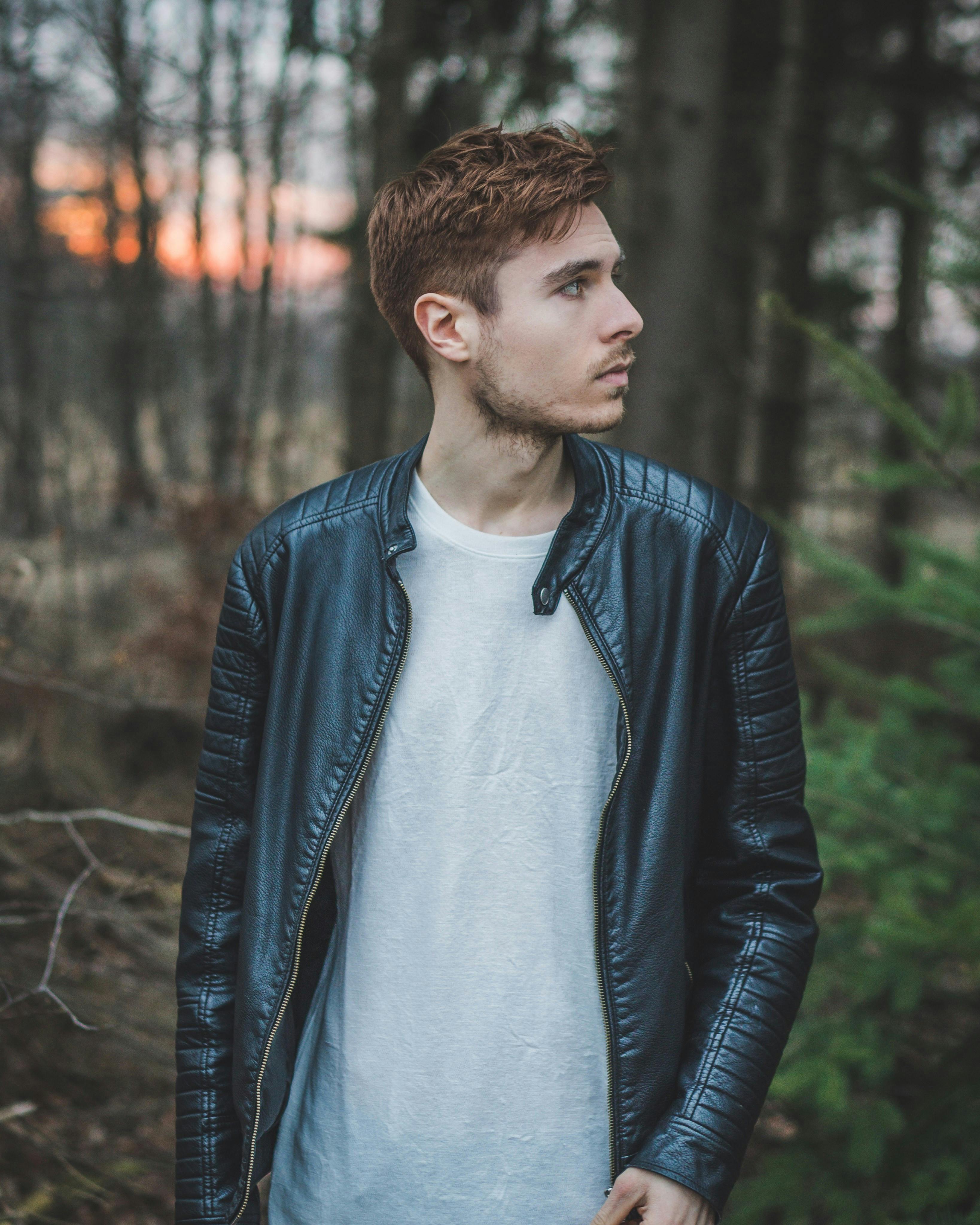 photo of a man wearing black leather jacket