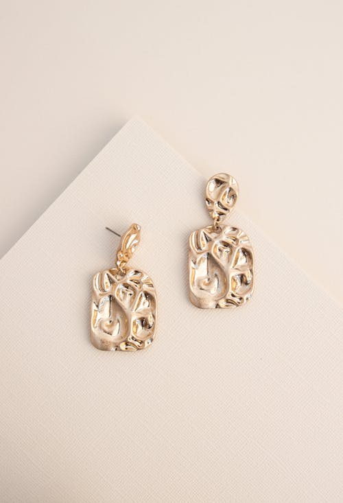 Free Gold Earrings in Close Up Photography Stock Photo