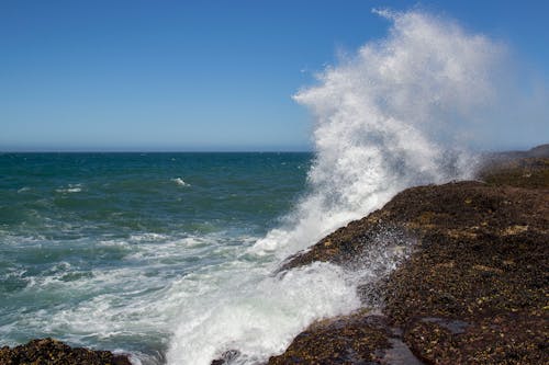 Sea Waves Crashing on Rock Formation