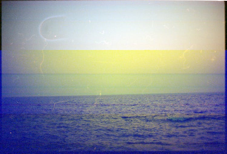 Seascape Image With Overlapped Yellow And Blue Colours