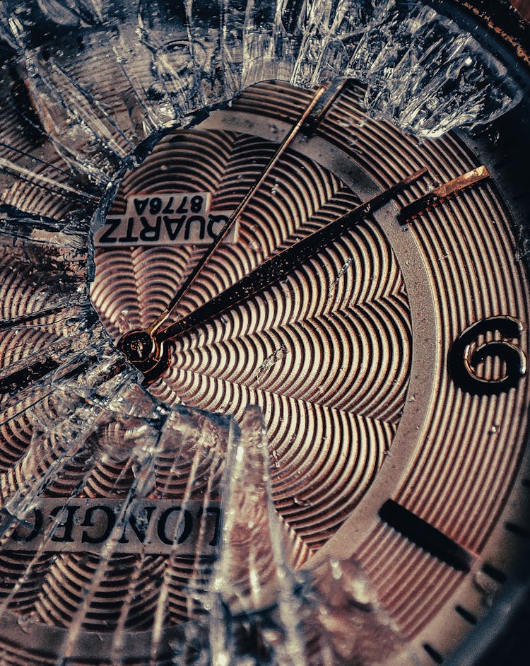 Close-up Of A Watch With Shattered Glass