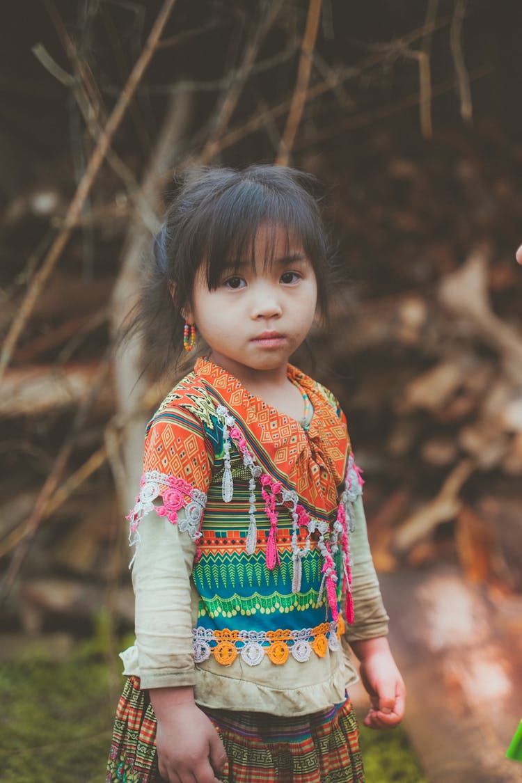 A Cute Girl Wearing A Printed Shirt