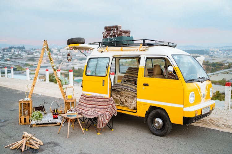 Yellow Vintage Vehicle Decorated In Fairy Lights