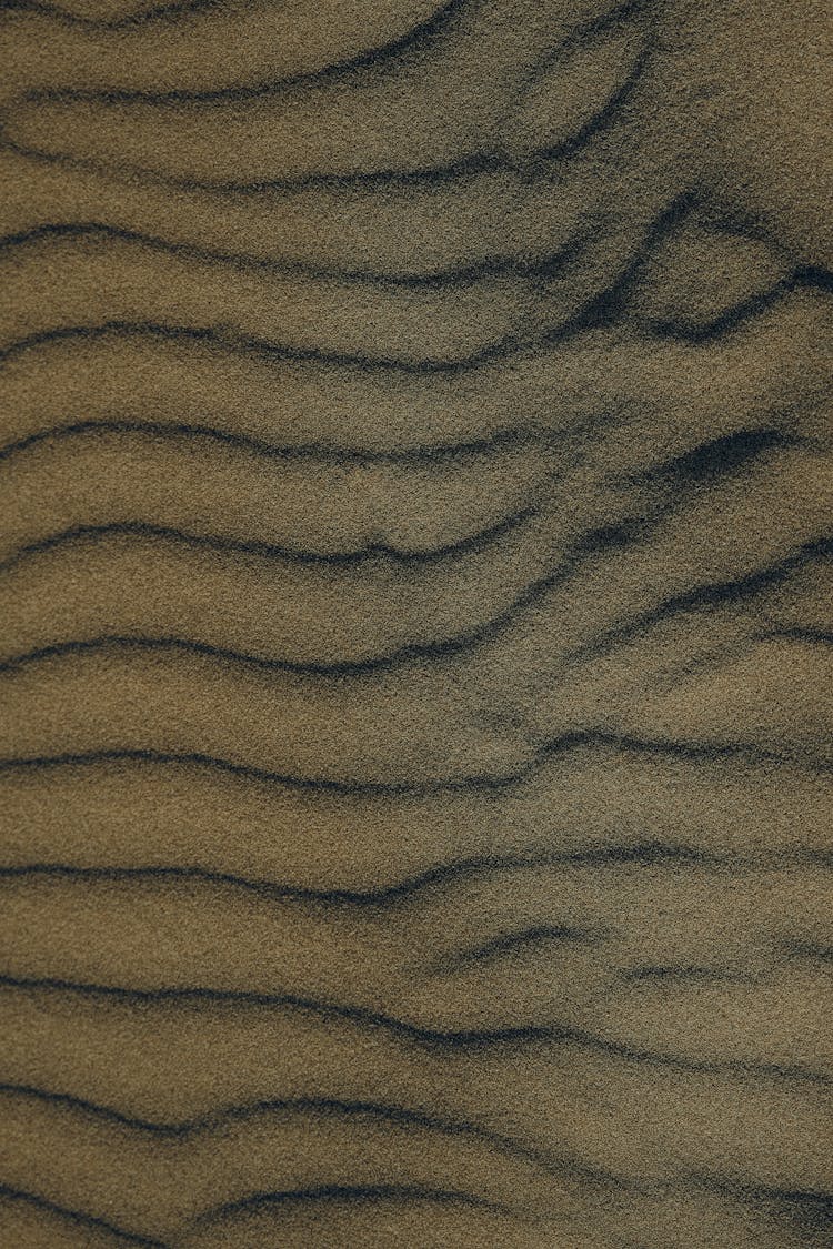 Overhead Shot Of Patterns On Sand