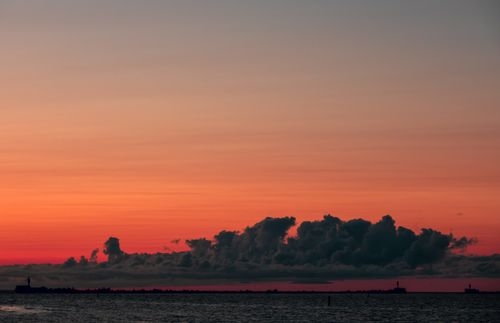 Free Beautiful sunset over the Baltic Sea with dramatic clouds in Liepāja, Latvia. Stock Photo