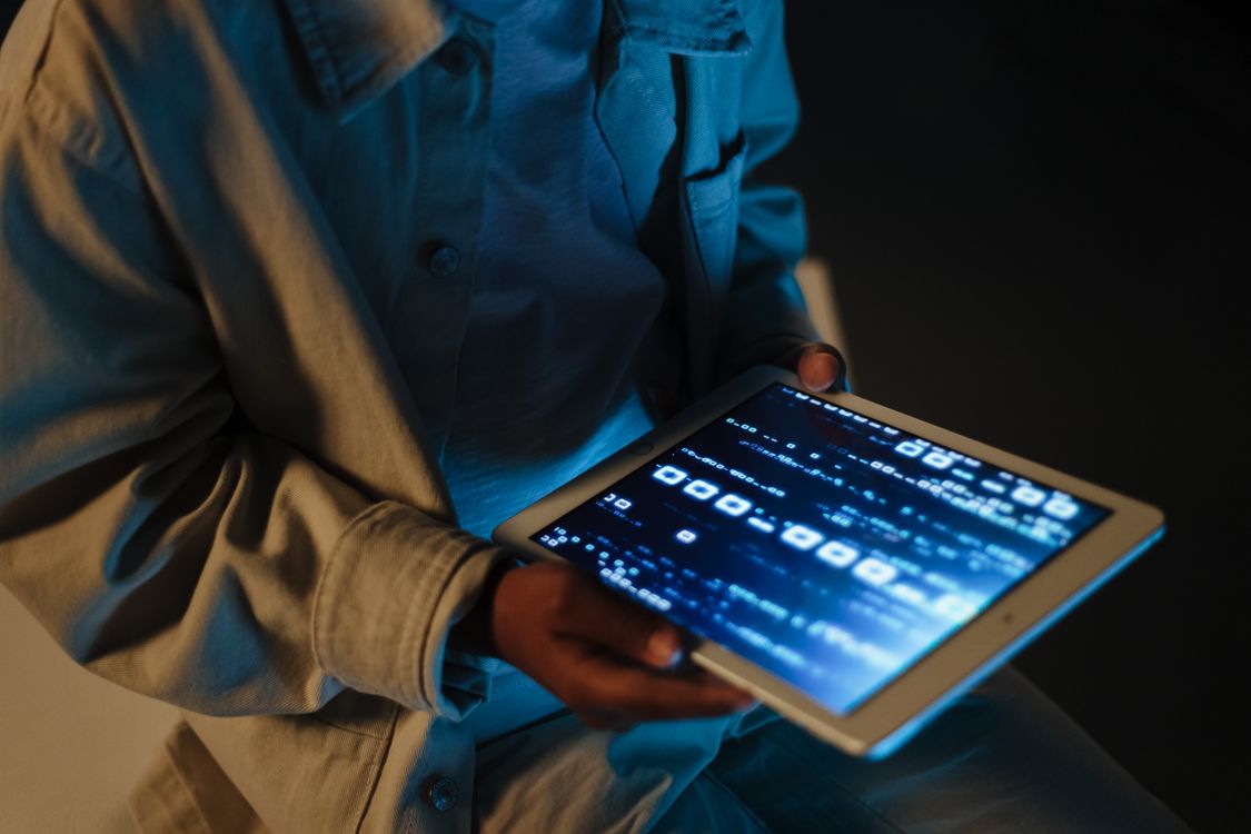 A Person Holding a Tablet · Free Stock Photo