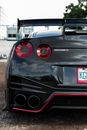 Close Up Photo of a Black Nissan Gtr Car