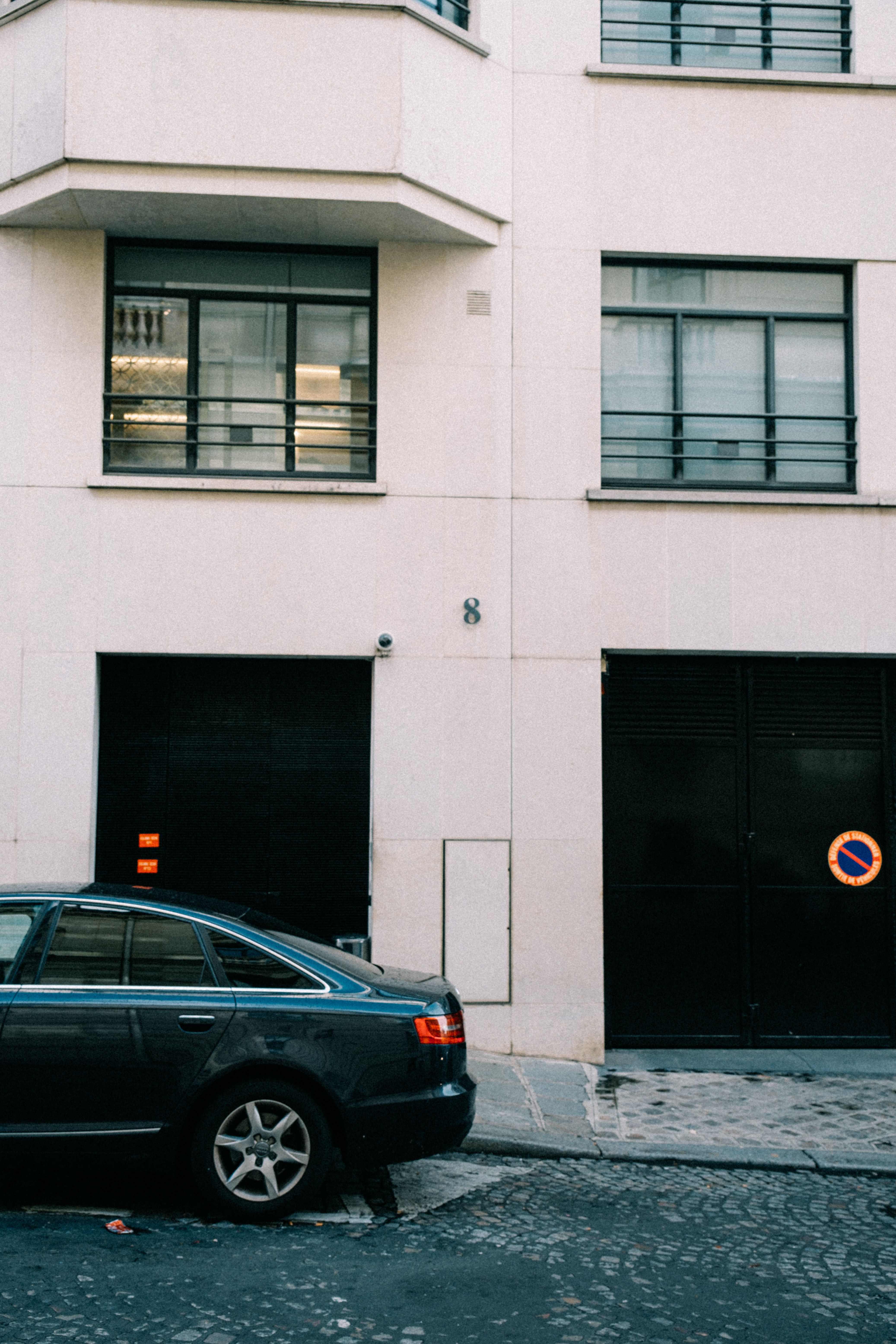 Car parked on a city street that can be secured with the KLUNK wheel lock