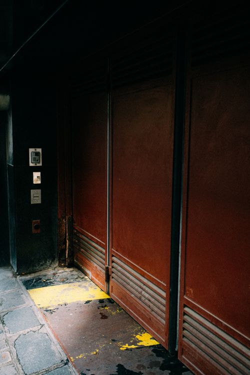 Free A moody urban industrial doorway with a rustic metal finish, exuding mystery and intrigue. Stock Photo