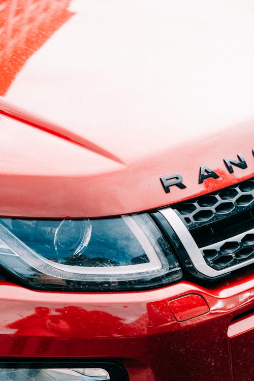 Free Red Car Headlight and Bumper Stock Photo