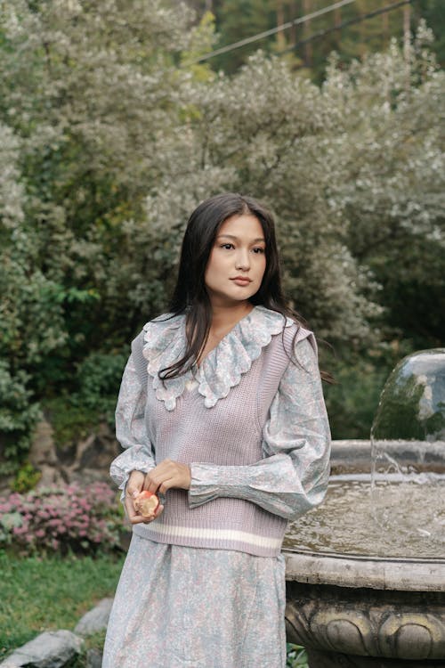 Woman in Long Sleeves Dress Looking Afar