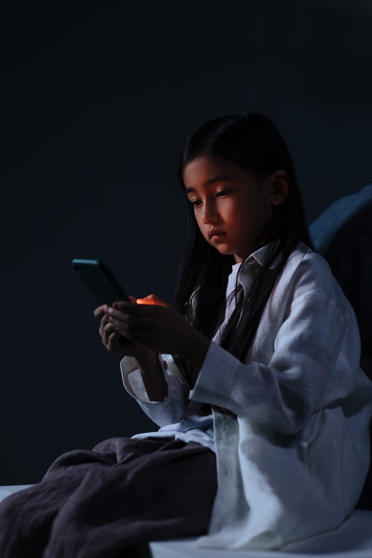 Young Girl Using Smart Phone