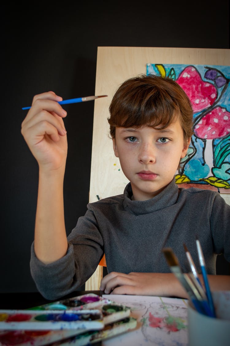 Boy Holding A Paintbrush 