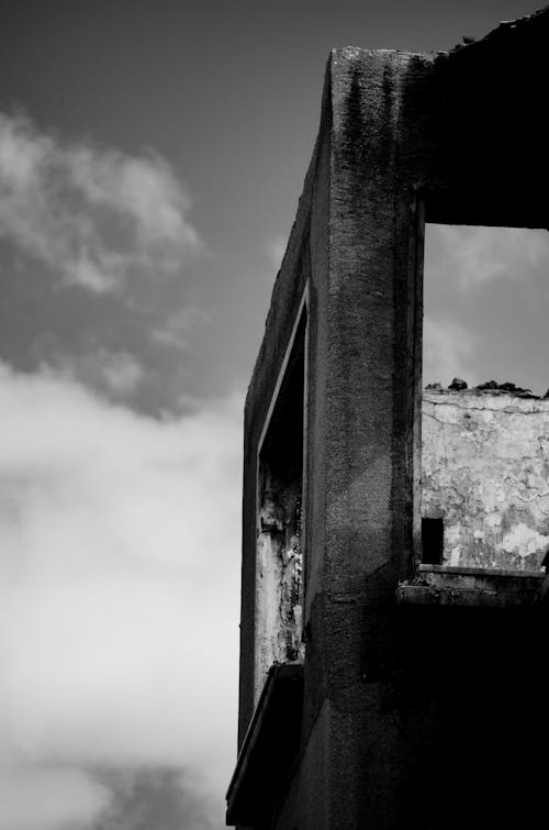 Grayscale Photo of an Abandoned Building