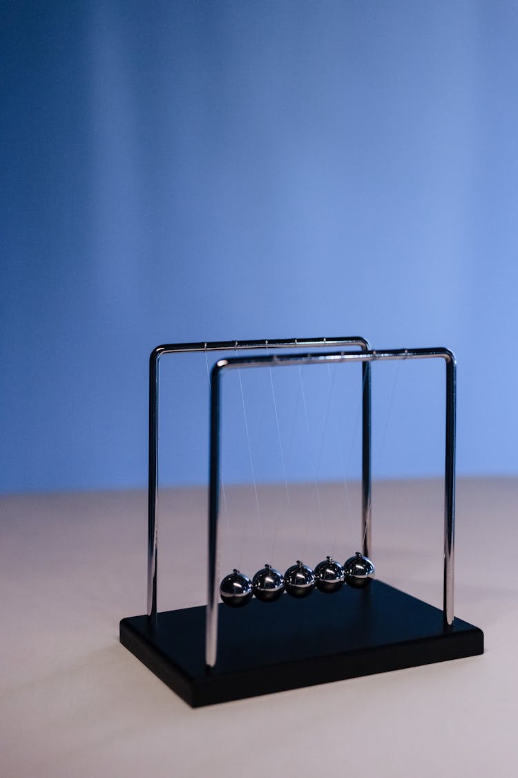 Newton S Cradle On A Table