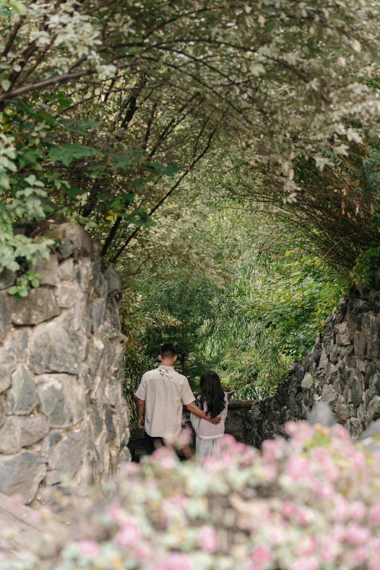 Couple Near Stone Walls