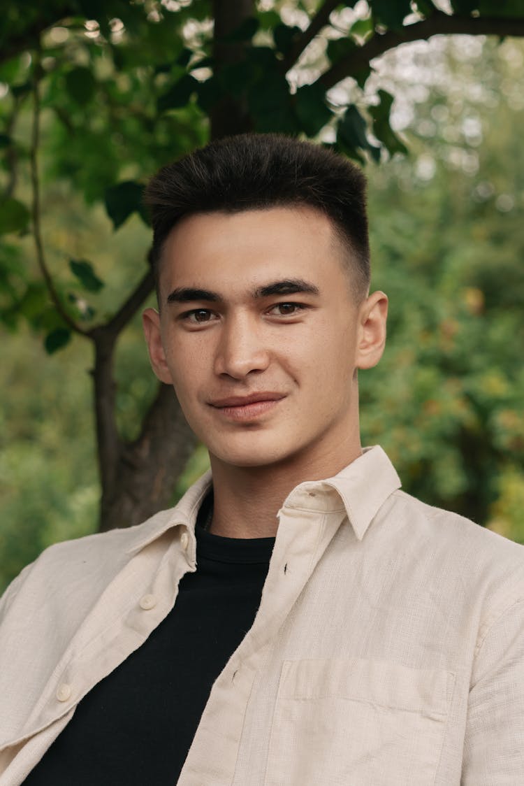 Portrait Of A Man In Beige Button Up Shirt