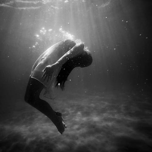Free Woman Under the Water Stock Photo