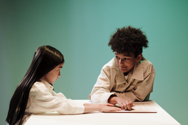 Teenage Girl Covering With Hands Her Part Of Puzzle