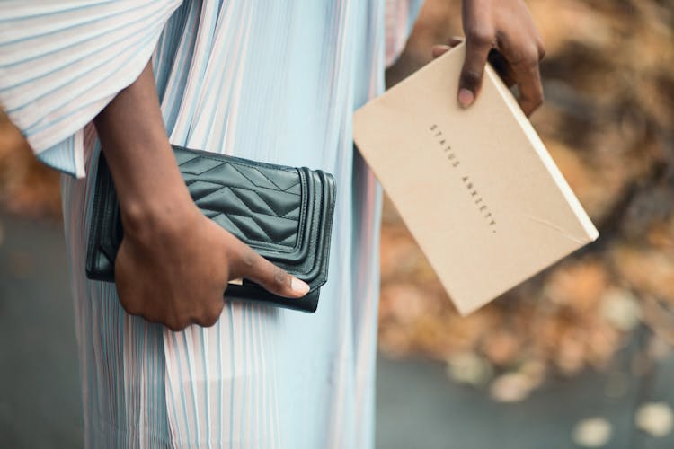 Person Holding Black Leather Wallet