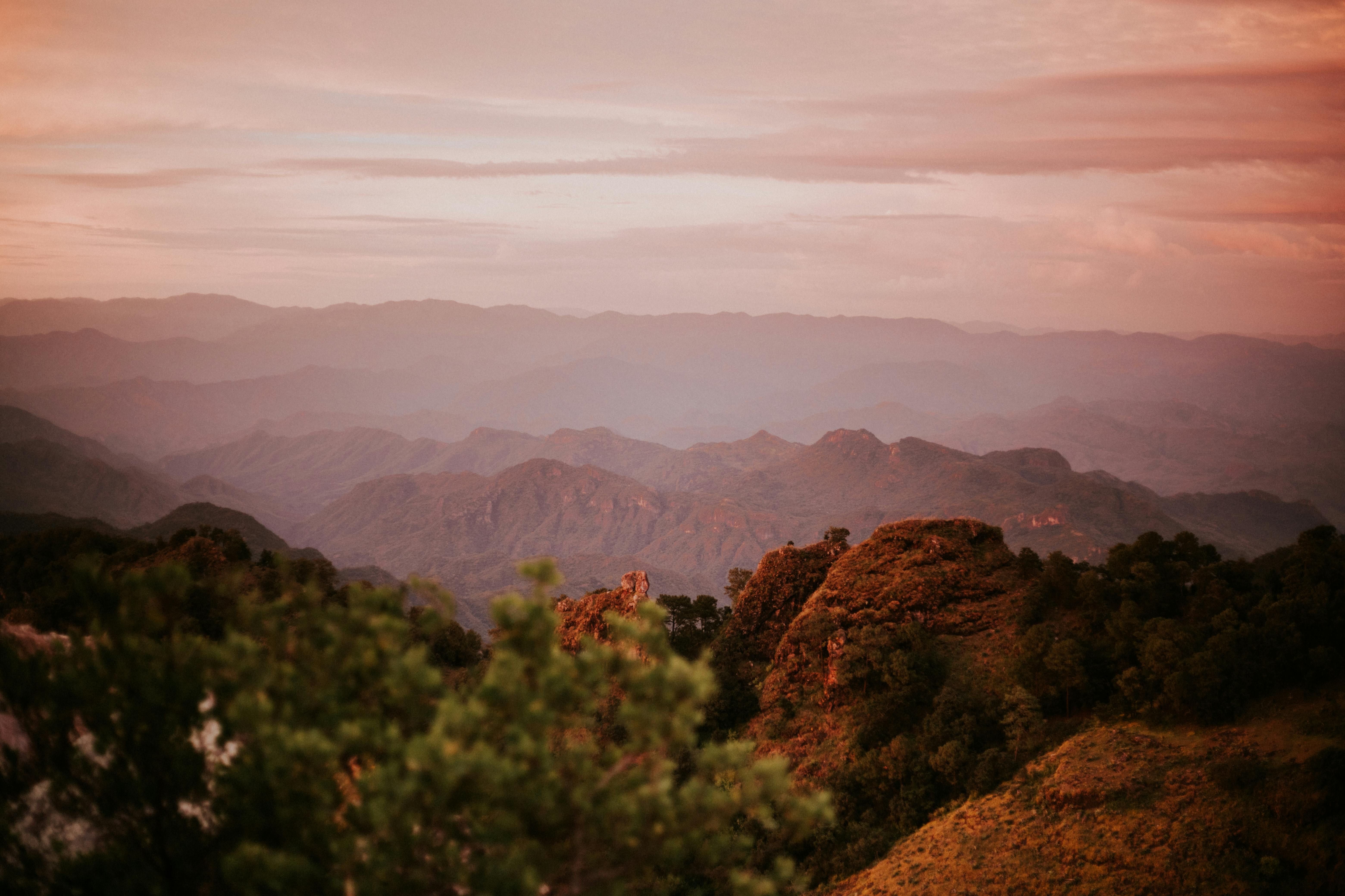 scenic view of mountains during dusk in tilt shift lens