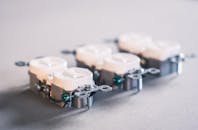 Three White Wall Sockets