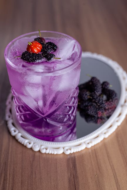 A close-up shot of a colorful and creatively garnished mocktail