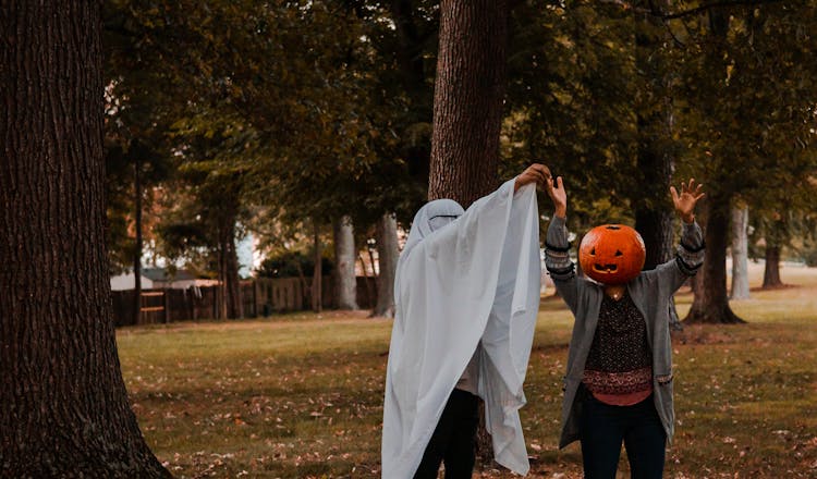 A Couple Wearing Halloween Costumes