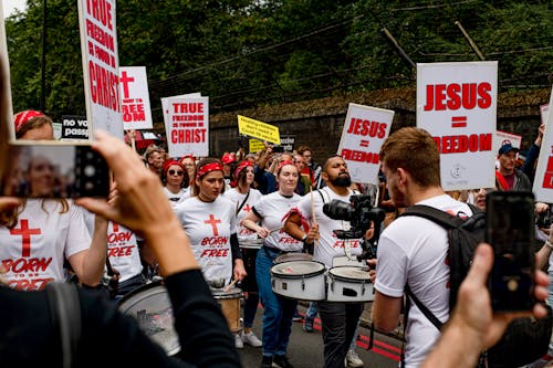 Free A Group of People Holding Placards Stock Photo