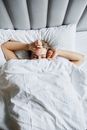 A Woman Sleeping in the Bed