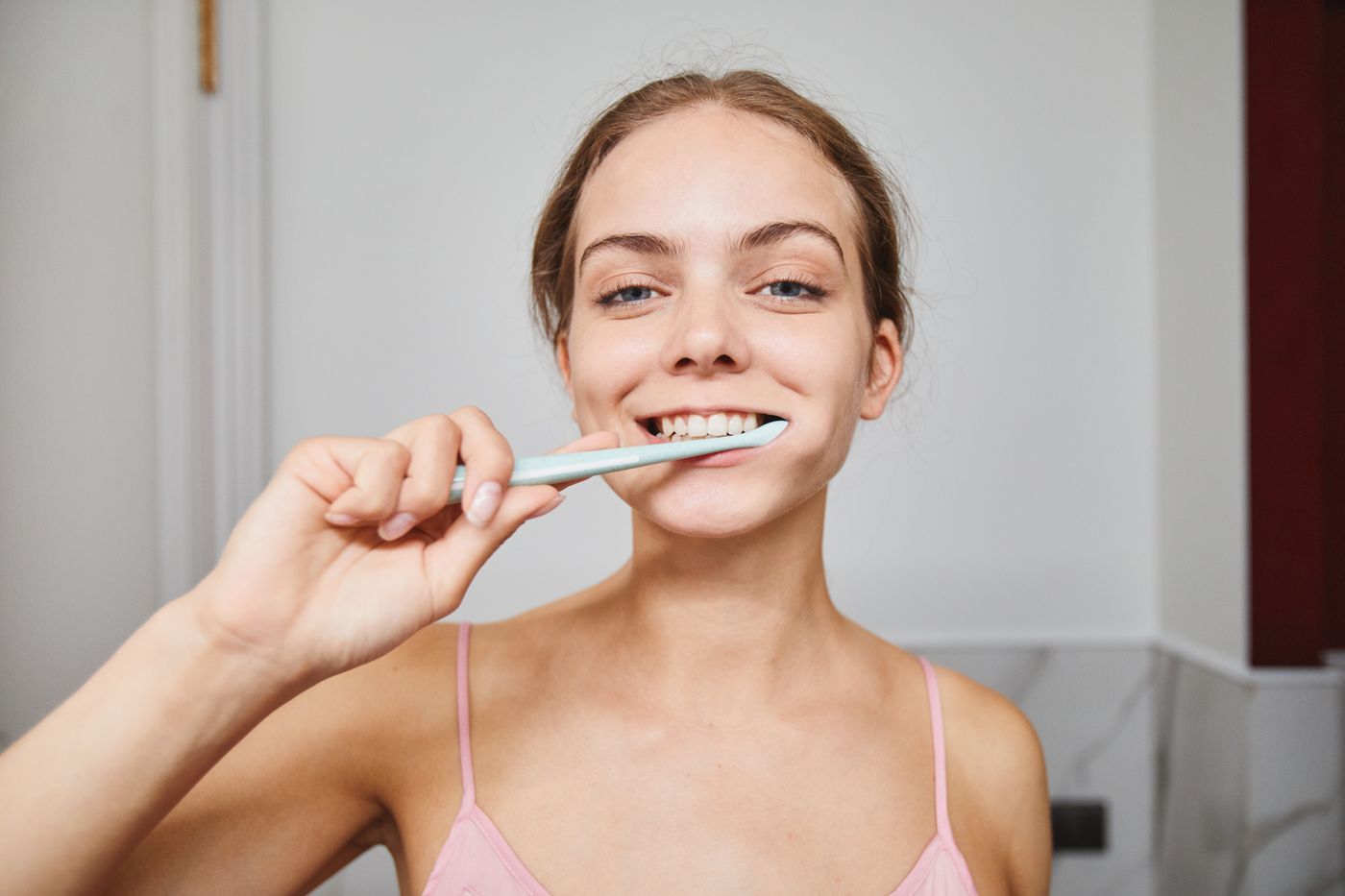 Dentist with smiling patient
