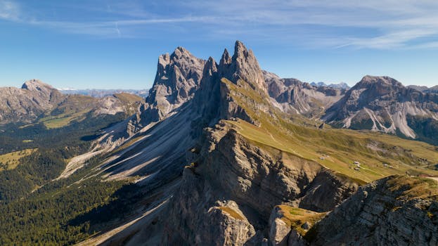 Experience the breathtaking aerial view of the jagged peaks of the Dolomites in Trentino-Alto Adige, Italy.