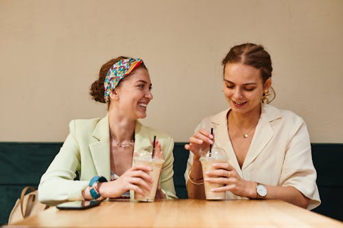 Free Women Holding Iced Coffee Stock Photo