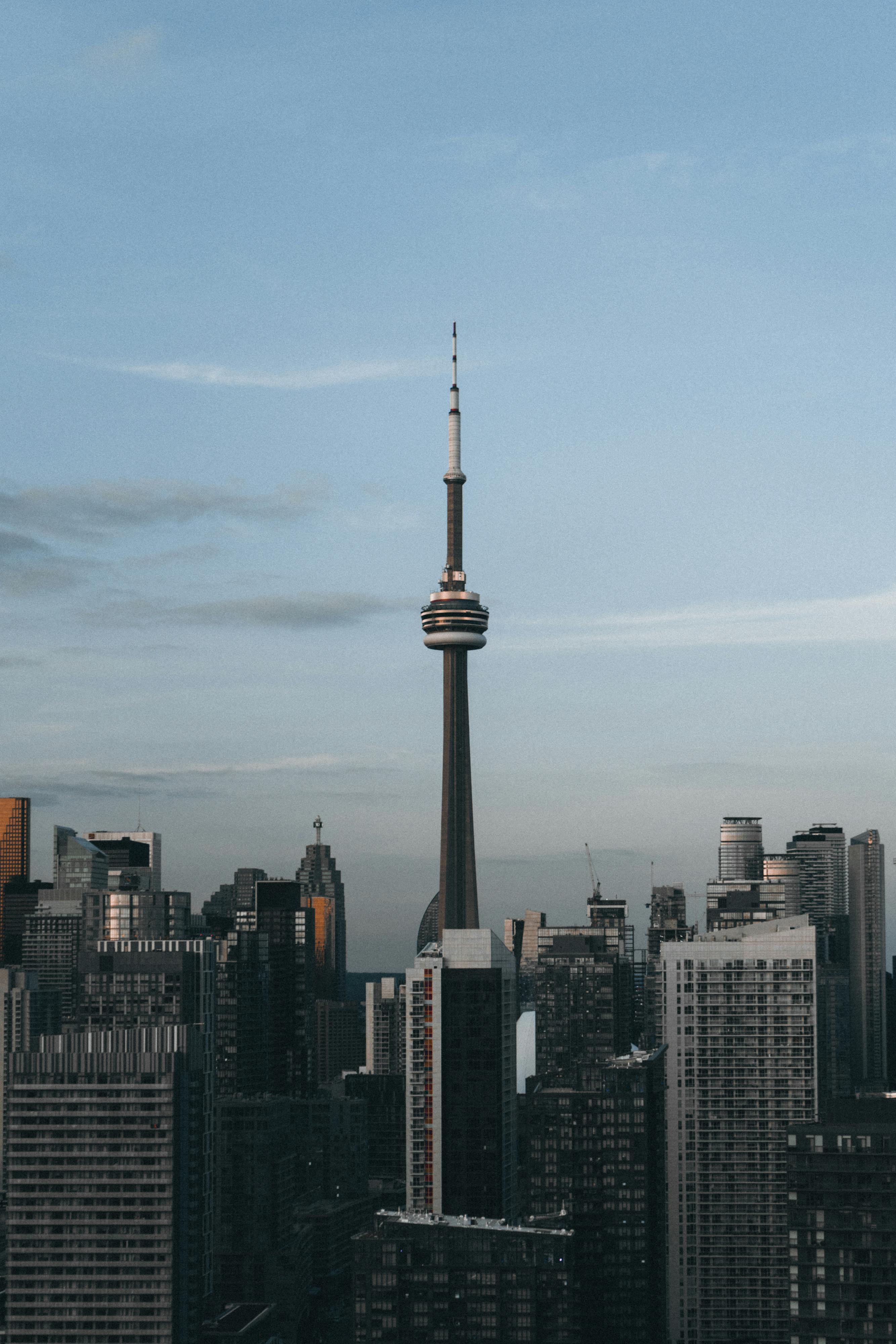 A stunning view of Toronto's skyline featuring the iconic CN Tower and skyscrapers.