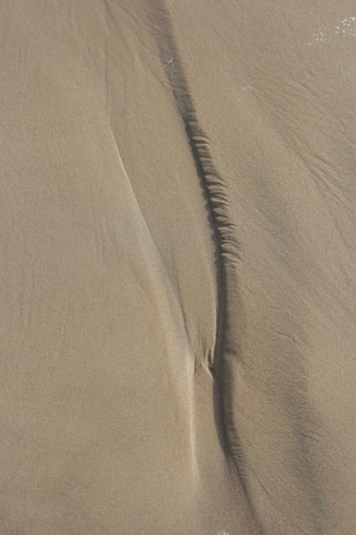 Drone Shot of Brown Sand 