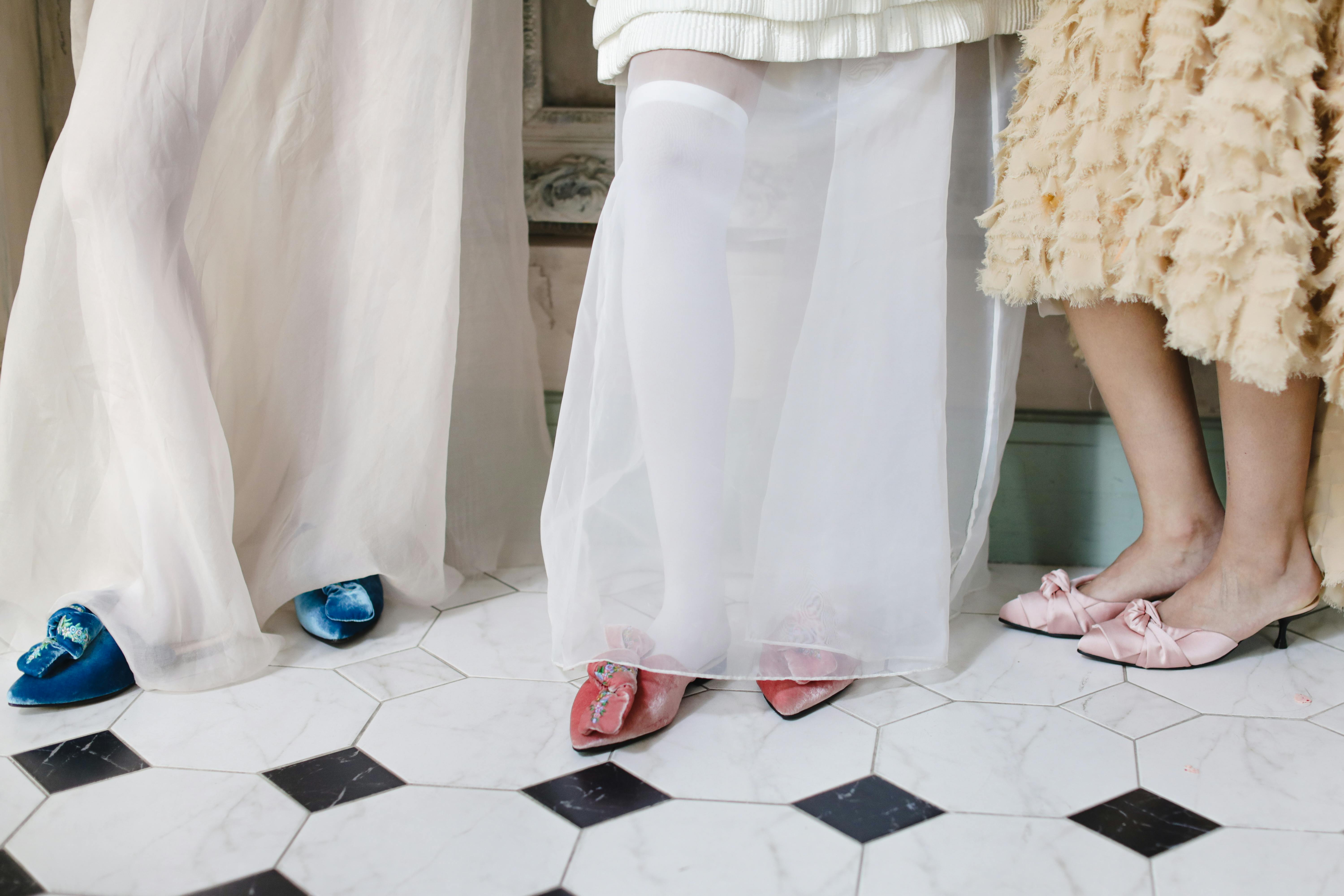 Close-up of women's elegant shoes in a vintage setting, showcasing classic fashion and style.