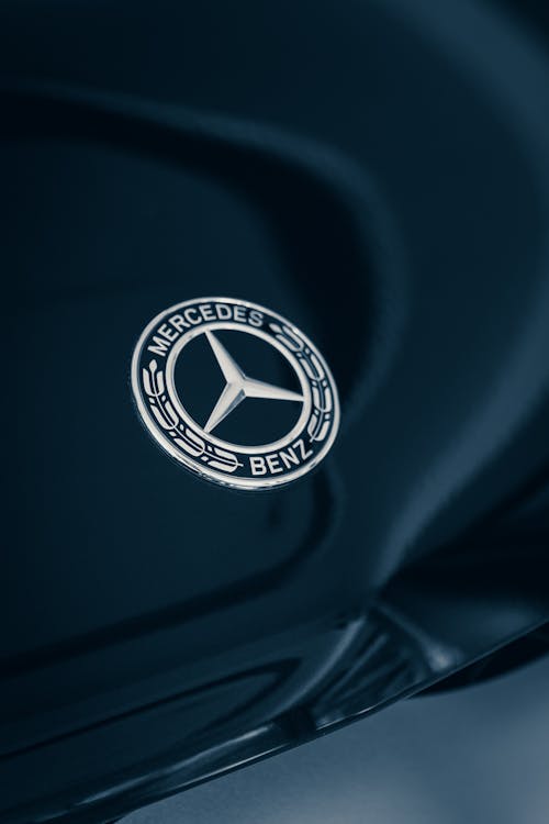Free Close-up Photo of a Mercedes-Benz Logo Stock Photo