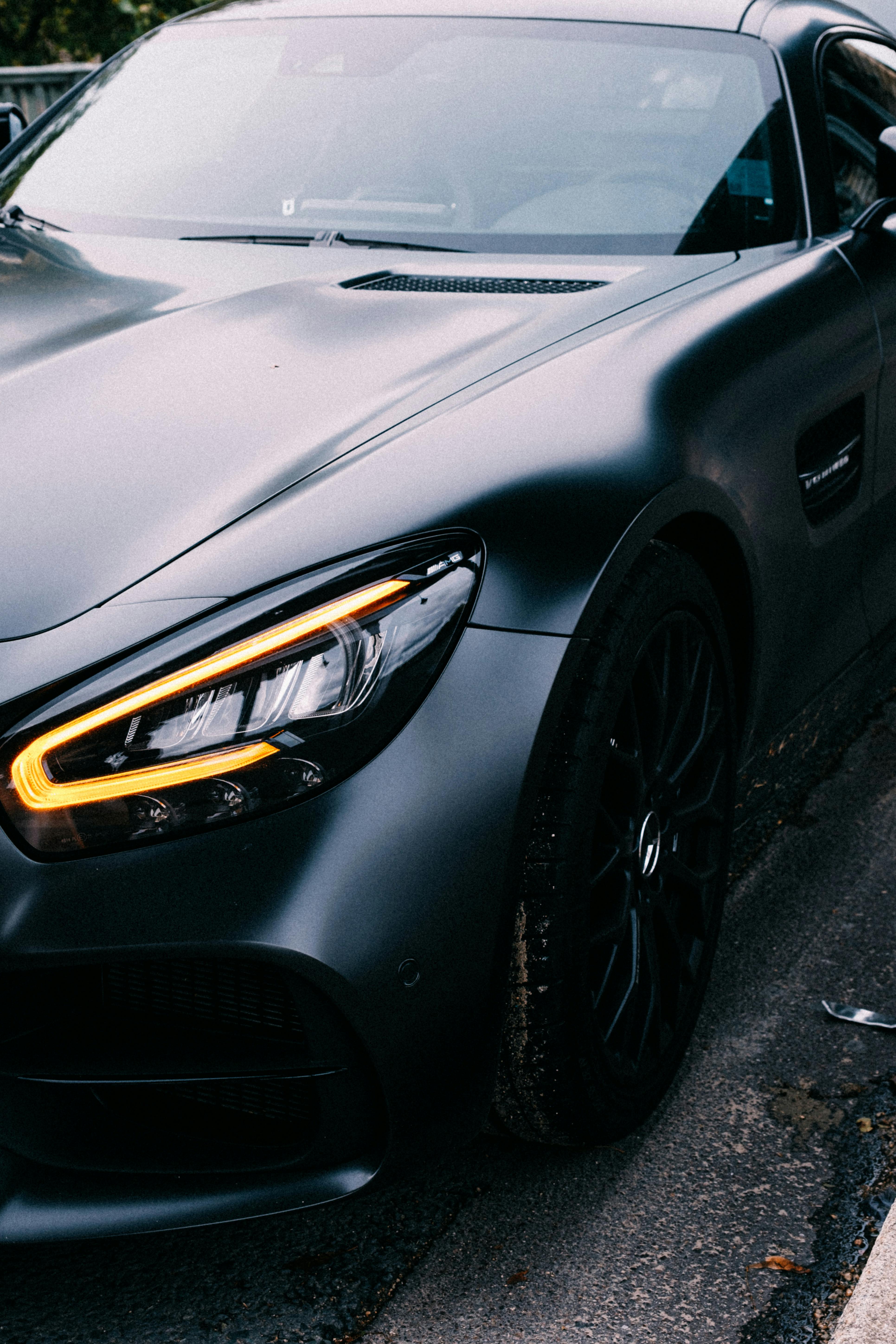 Photograph of a Car with Yellow Headlights · Free Stock Photo