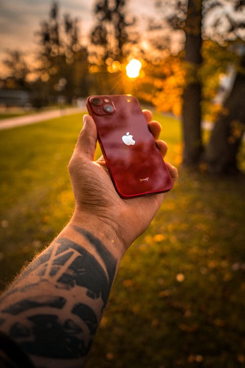 Free Person Holding Red Iphone  Stock Photo