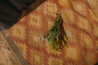 Bouquet of Flowers on Orange Carpet