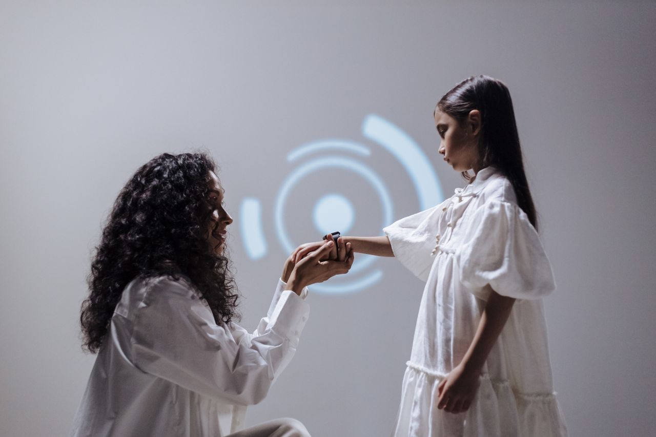 a mother and daughter connect through digital technology in a modern s