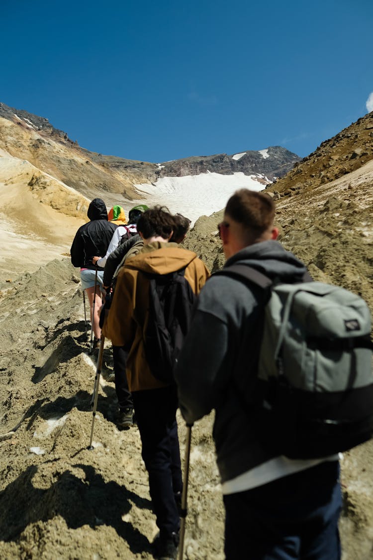 People Hiking On Mountain