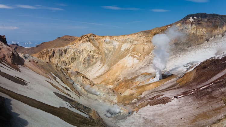 Geyser In Mountains